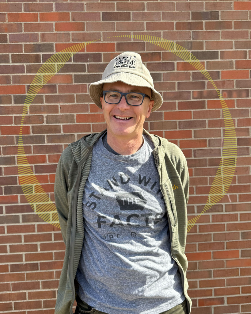 Photo of RIver to RIver host Ben Kieffer wearing the new IPR Bucket Hat!